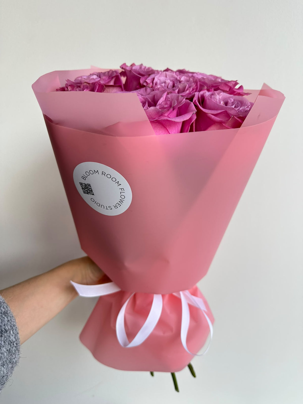 “Pink Love Story” bouquet of 9 lilac-pink Queens Crown roses in pink wrapping
