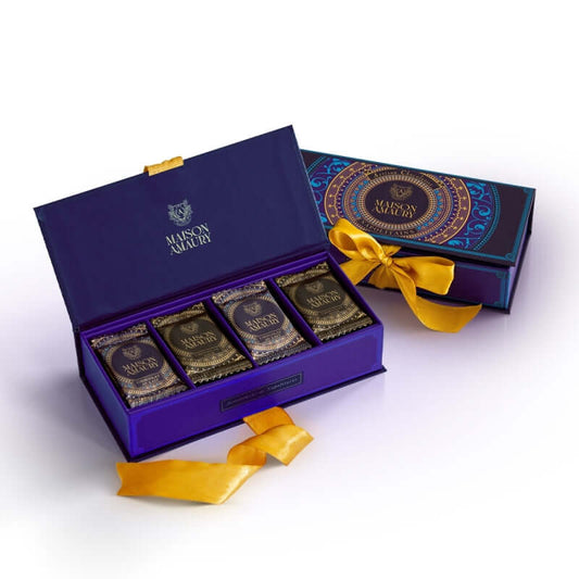 MAISON AMAURY exclusive chocolate gift box in blue with gold accents, featuring 21 pieces and luxurious packaging.