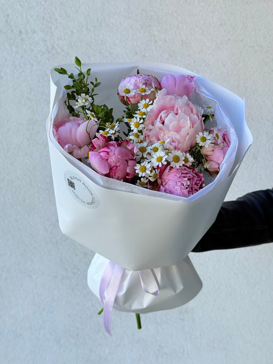 Pink peonies with Matricaria