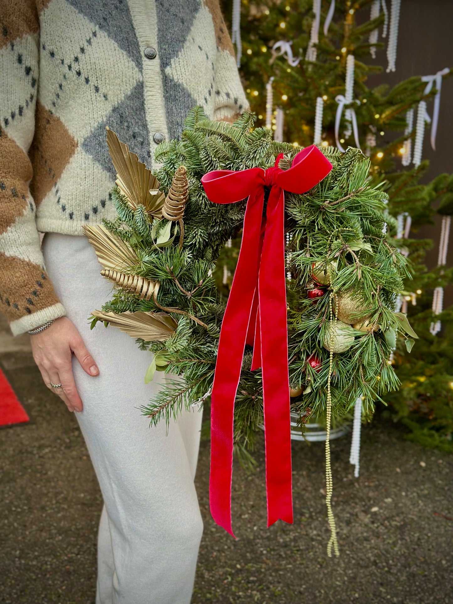 Jõulukook | Рождественский венок | Christmas wreath with red ribbon and decorative elements.