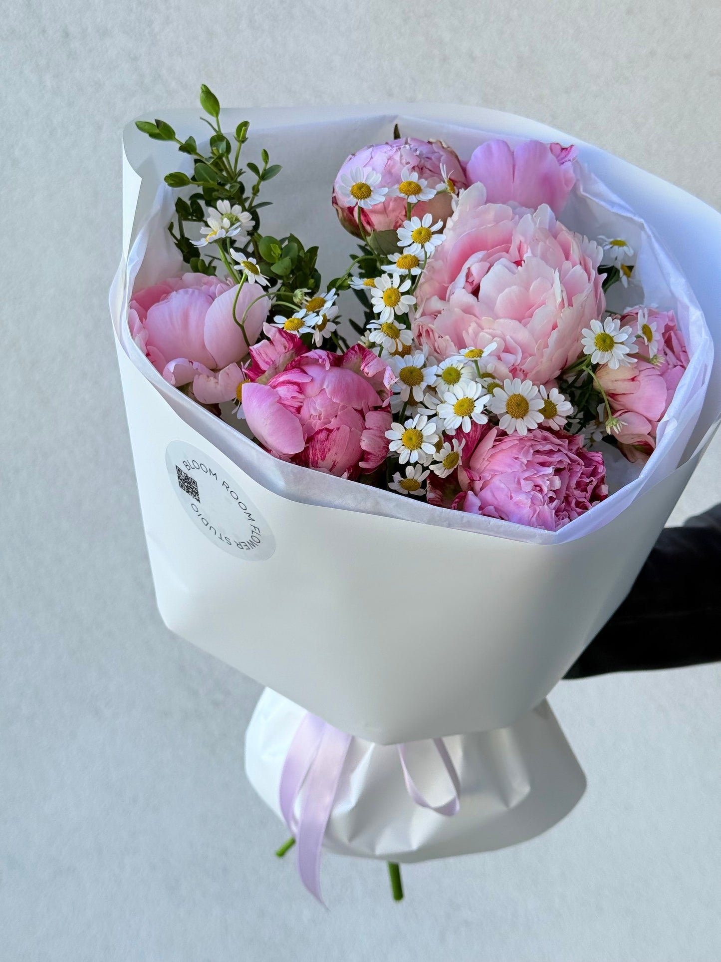 Pink peonies with Matricaria