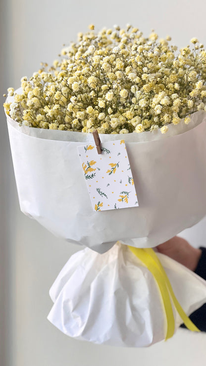 Kollaste lillede kimp valges pakendis | Букет желтых цветов в белой упаковке | Yellow flower bouquet in white wrapping