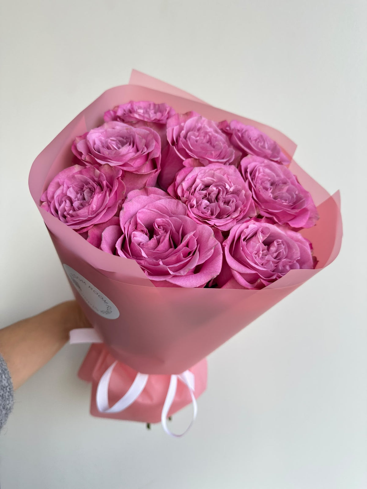 “Pink Love Story” bouquet of 9 lilac-pink Queens Crown roses in pink wrapping