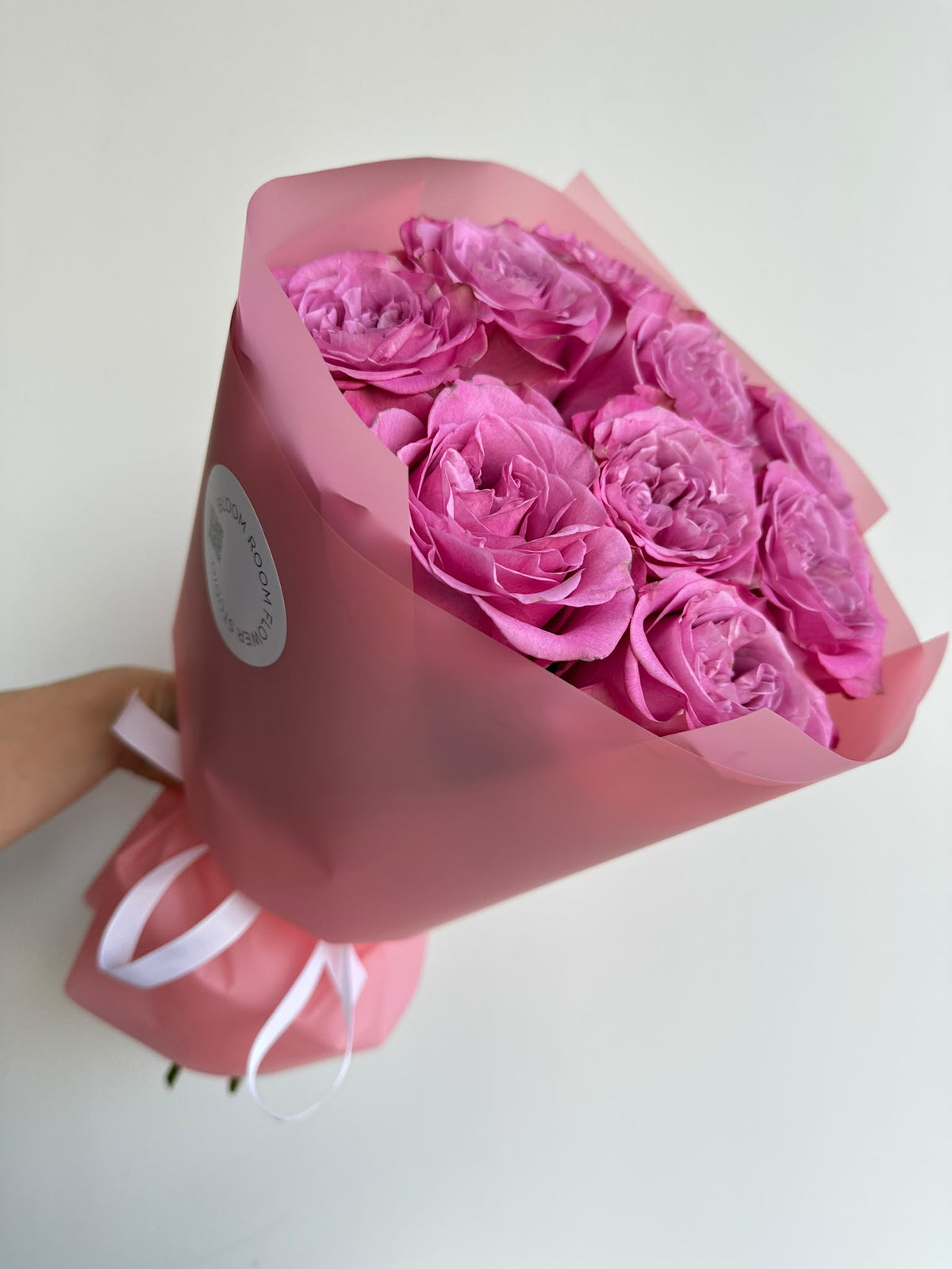 “Pink Love Story” bouquet of 9 lilac-pink Queens Crown roses in pink wrapping