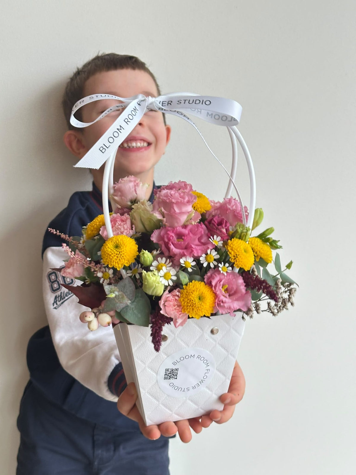 Close-up of Hold me close flower bag with eustoma, carnations and chamomile