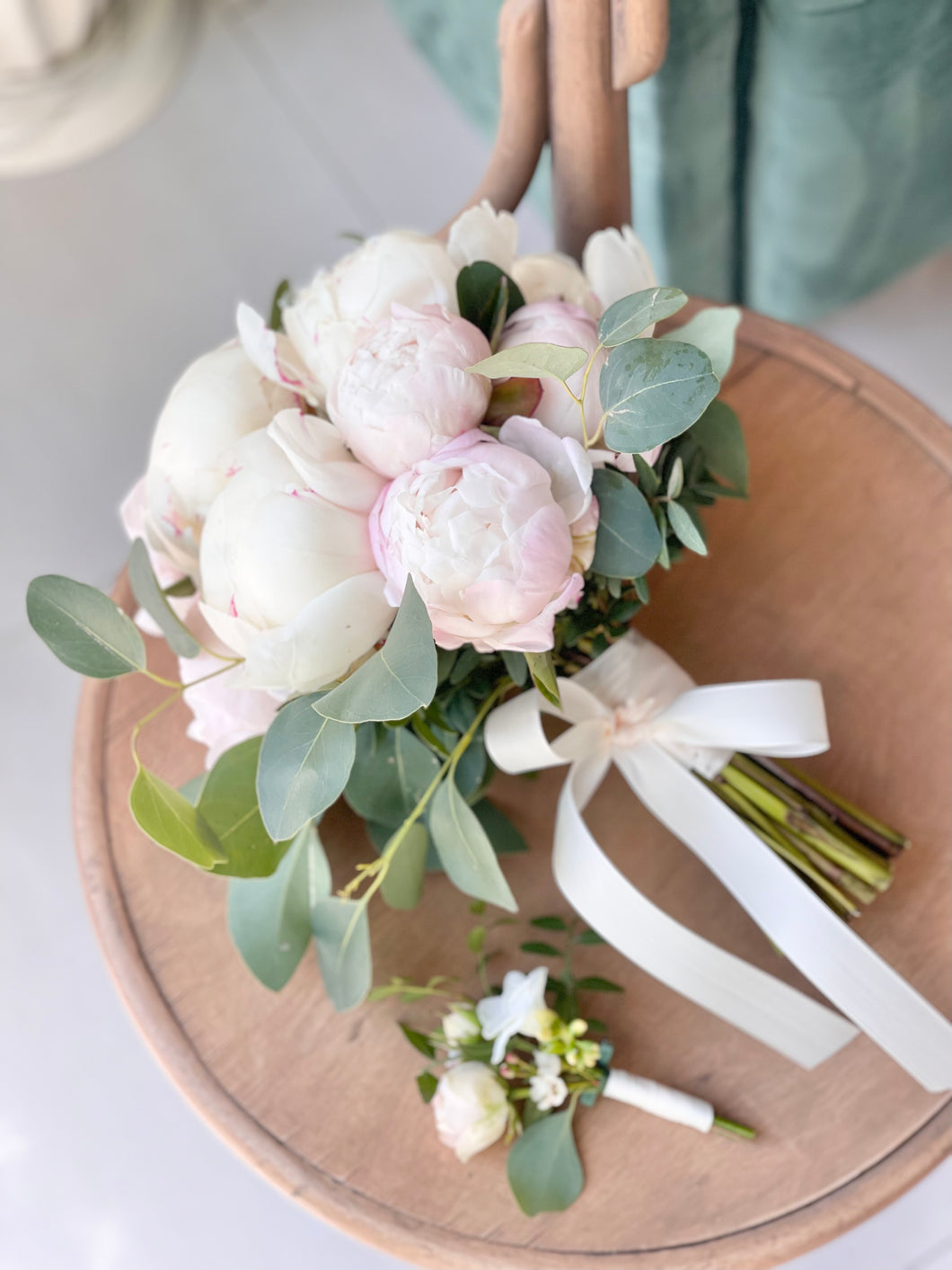 Brides bouquet with peonies